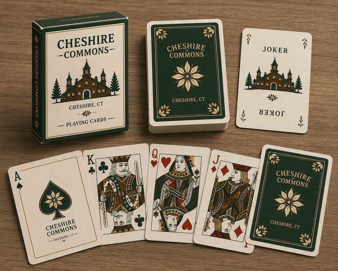Deck of Cheshire Commons playing cards with green and gold crest design, fanned out
